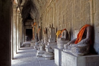 Buddhist idols in the hall at Angkor Wat.